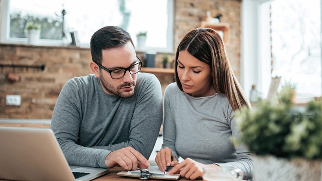 Couple reviewing documents