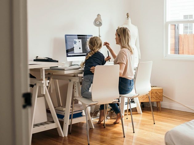 Mother and child at a computer