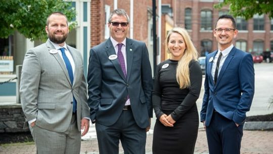 Kennebunk savings team posing outside