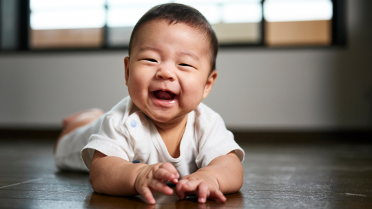 baby crawling on floor