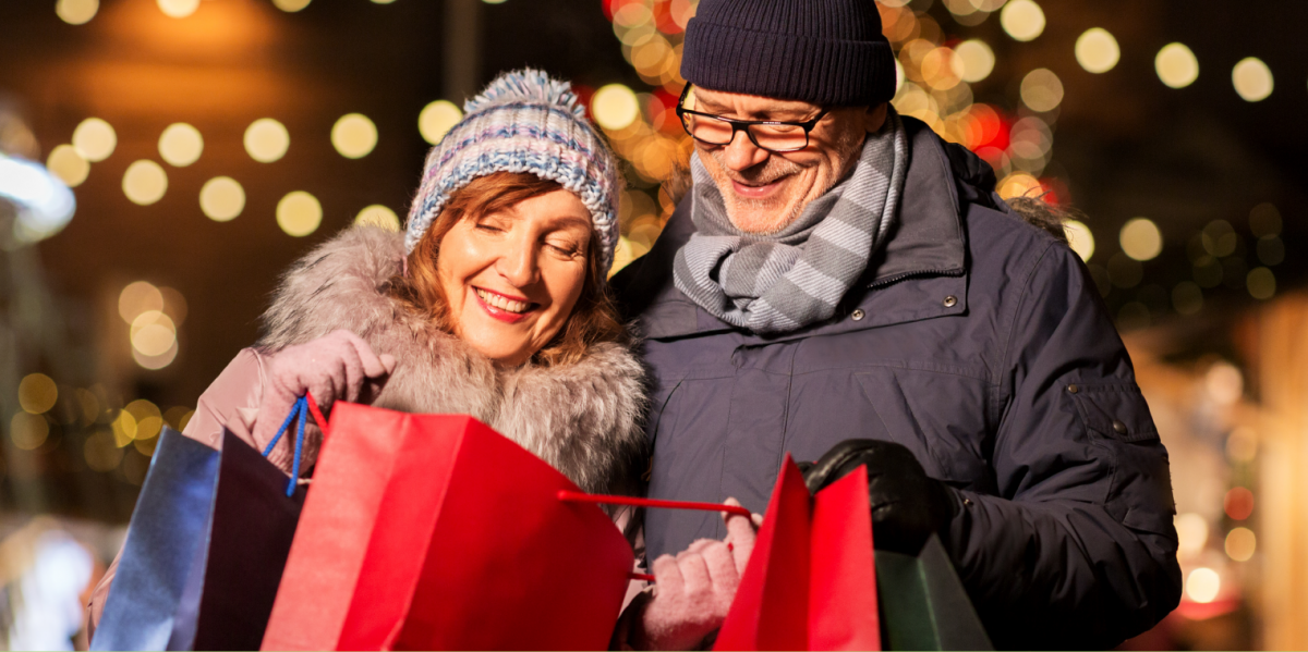 Husband and wife shopping for holiday gifts